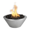 Polished stainless steel Cazo fire bowl with a tapered round design, showcasing vivid golden flames dancing above black lava rocks for luxury patio spaces.