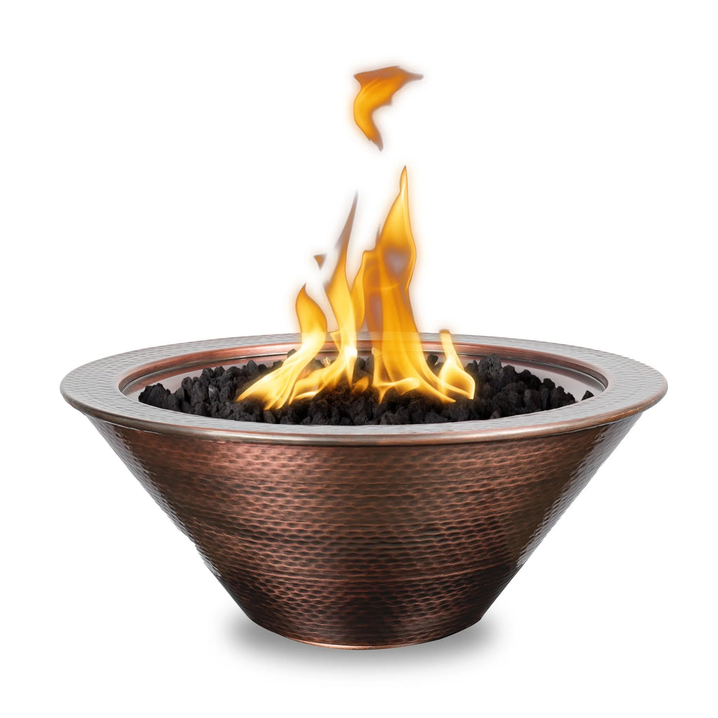Elegant Cazo fire bowl crafted from hammered copper, beautifully ignited with clean, vibrant flames. Designed for modern outdoor settings, this decorative gas fire bowl combines luxury style with durable performance.