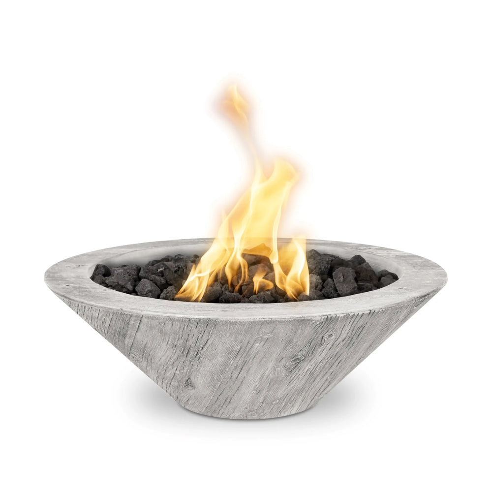 Ivory Cazo Woodgrain GFRC fire bowl with lifelike woodgrain texture, filled with black lava rock and producing vibrant golden flames for timeless outdoor style.