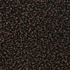 Detailed swatch of The Outdoor Plus Copper Vein powder-coated metal, featuring a rich, speckled black and bronze texture that adds depth and industrial charm to outdoor decor.
