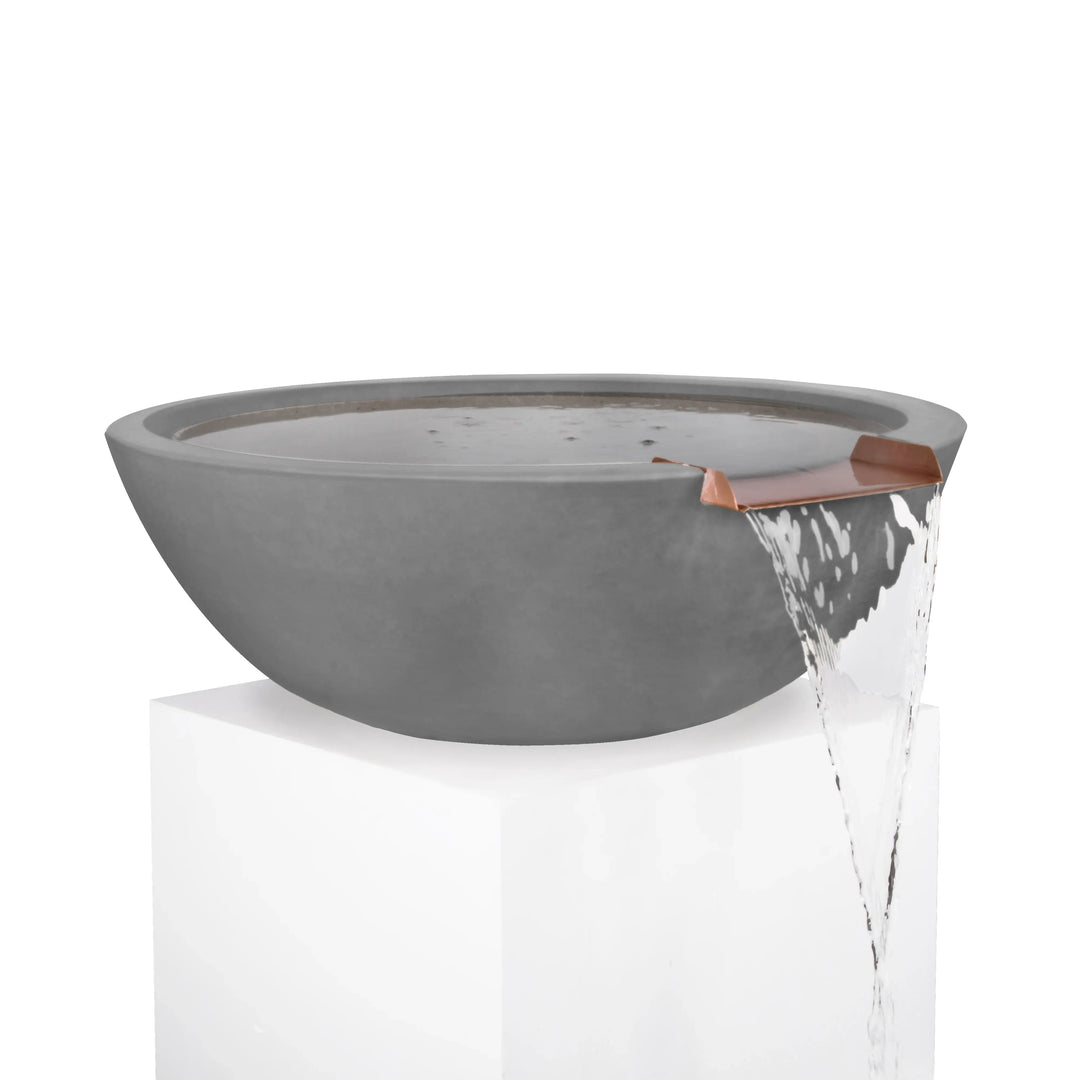 Natural gray Sedona water bowl with copper spillway, blending timeless style and functionality for elegant poolside waterfalls.