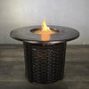 The Golden Flame Avalon 34” Round Cast Aluminum Natural Gas Fire Table features a sleek cast aluminum design with a vibrant flame, perfect for outdoor spaces. This durable round fire table enhances patios with its stylish look, including a central flame surrounded by reflective fire glass for warmth and elegance.