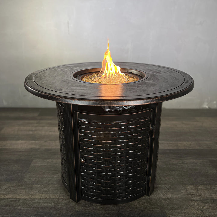 The Golden Flame Avalon 34” Round Cast Aluminum Natural Gas Fire Table features a sleek cast aluminum design with a vibrant flame, perfect for outdoor spaces. This durable round fire table enhances patios with its stylish look, including a central flame surrounded by reflective fire glass for warmth and elegance.