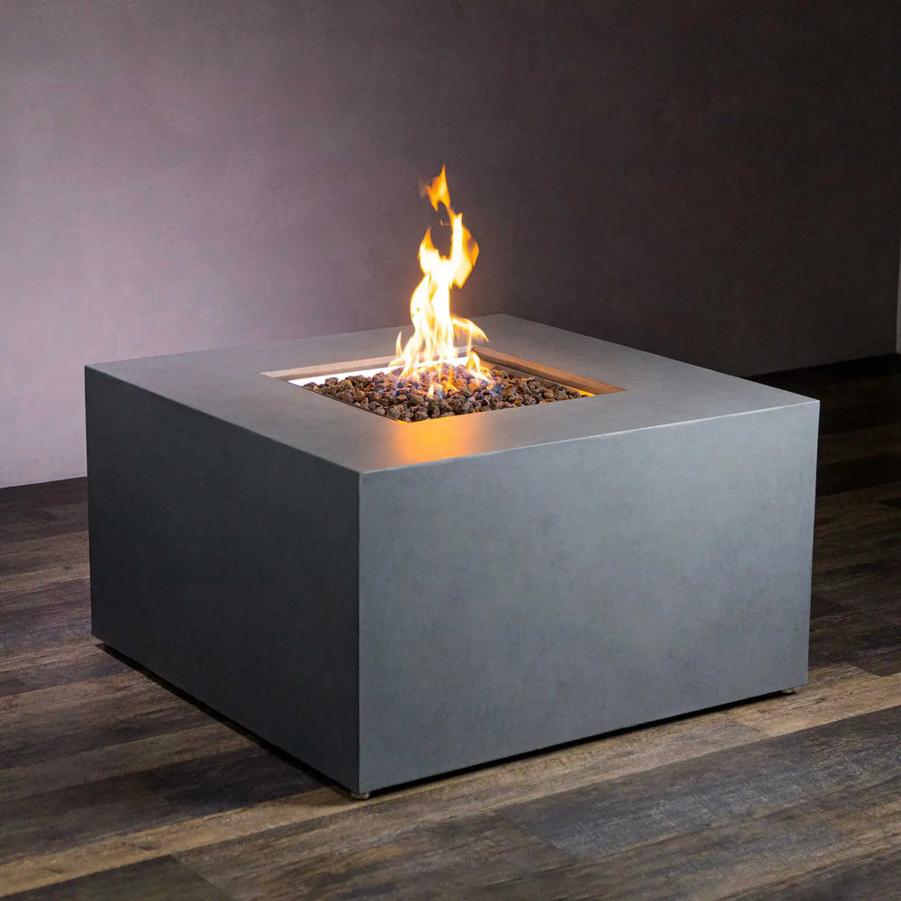 Starfire Designs Beton 42" square gas fire pit in natural gray, featuring a sleek modern design with hidden propane tank storage, perfect for contemporary outdoor patio settings