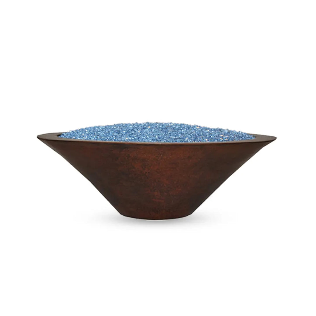 Round copper fire pit with a smooth, wide bowl shape, filled with blue fire glass, adding a modern and stylish touch to outdoor spaces