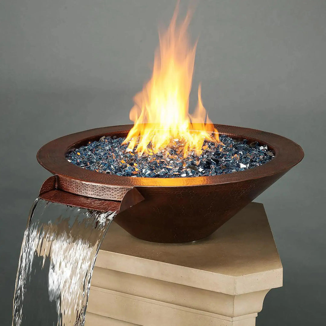 Cono Moreno 31-inch W Round Copper Fire and Water Bowl by Starfire Designs, featuring a hand-hammered copper finish with cascading water and blue reflective fire glass, perfect for luxury outdoor fire pits