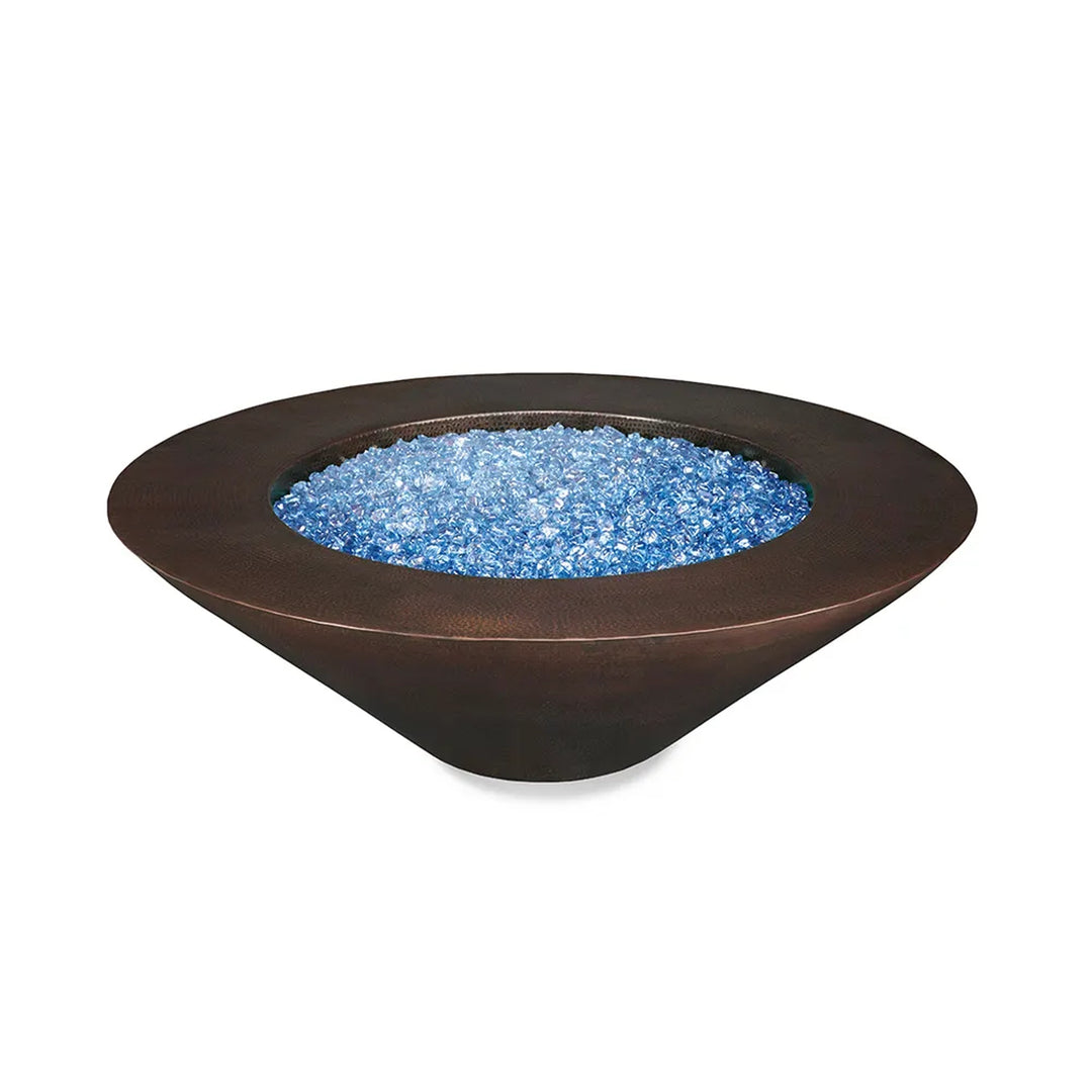 Conical copper fire pit bowl filled with blue fire glass, isolated on a white background