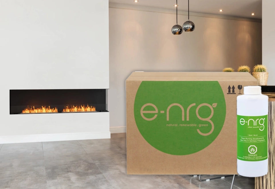 E-NRG bioethanol fireplace fuel displayed alongside a modern linear fireplace with clean flames in a contemporary living space.