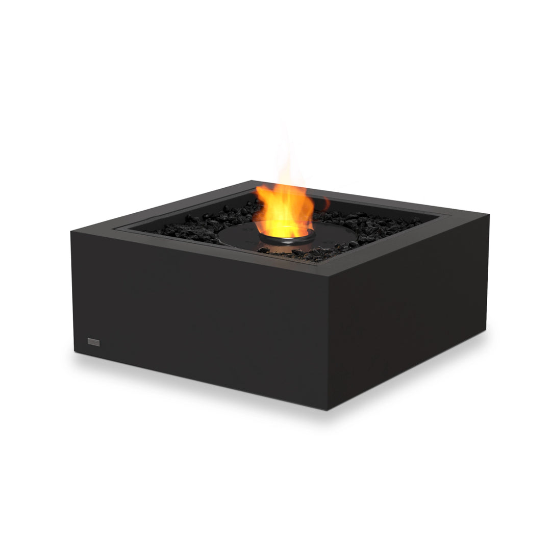 The EcoSmart Fire Base 30 Graphite fire pit showcases a black burner without a wind guard, emphasizing its minimalist and modern fire pit design. Fueled by clean-burning ethanol, this graphite-colored fire pit is an excellent centerpiece for contemporary outdoor or indoor spaces, providing a warm and ambient flame with no smoke or ash.