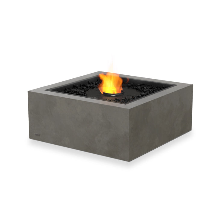 The EcoSmart Fire Base 30 in Natural showcases a sleek ethanol black burner set in a contemporary square concrete fire pit. The clean-burning ethanol system eliminates smoke, making it an excellent choice for modern outdoor spaces, patios, and backyard entertainment areas.