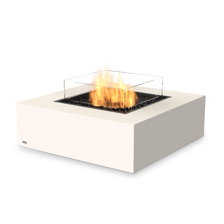 The EcoSmart Fire Base 40 Bone Propane Fire Pit with a wind guard combines functionality and contemporary design. Its bone-white concrete base supports a powerful propane burner, producing a clean, adjustable flame. Ideal for outdoor patios, backyards, and high-end hospitality settings, this fire pit ensures long-lasting durability and weather resistance.