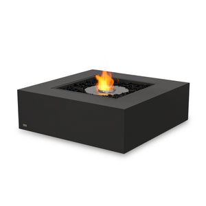 The EcoSmart Fire Base 40 in graphite with an ethanol stainless steel burner and a glass wind guard. This high-end fire pit offers a contemporary design with clean lines and a sophisticated finish. The protective glass barrier enhances flame stability, making it a stylish yet functional addition to outdoor lounges and patios.