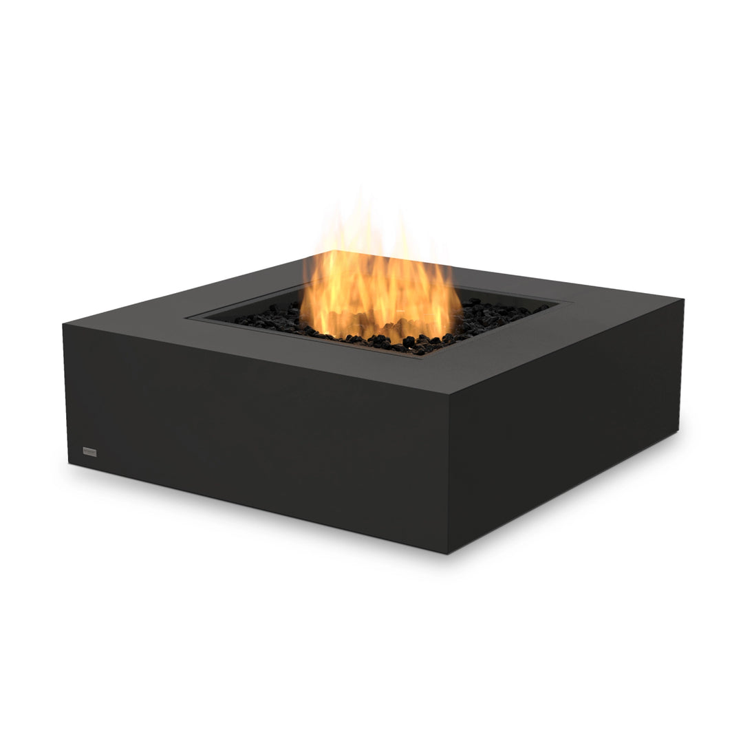 The EcoSmart Fire Base 40 Graphite with propane burner and wind guard is a premium outdoor fire pit designed for comfort and style. The transparent glass windscreen provides additional safety and protection, ensuring a steady flame even in breezy conditions. Its dark concrete body and high-end aesthetic make it ideal for luxury outdoor settings. 