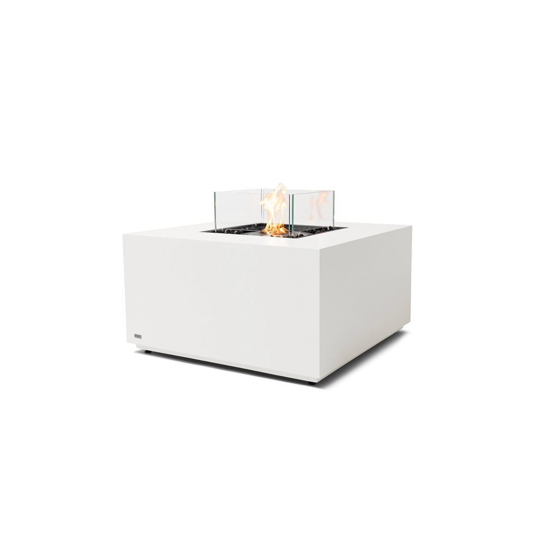 The EcoSmart Fire Chaser 38 Bone with a stainless steel burner and wind guard is a contemporary square gas fire pit with a durable bone concrete body. The stainless steel burner enhances longevity, making it ideal for luxury outdoor spaces, modern patios, and high-end commercial venues.