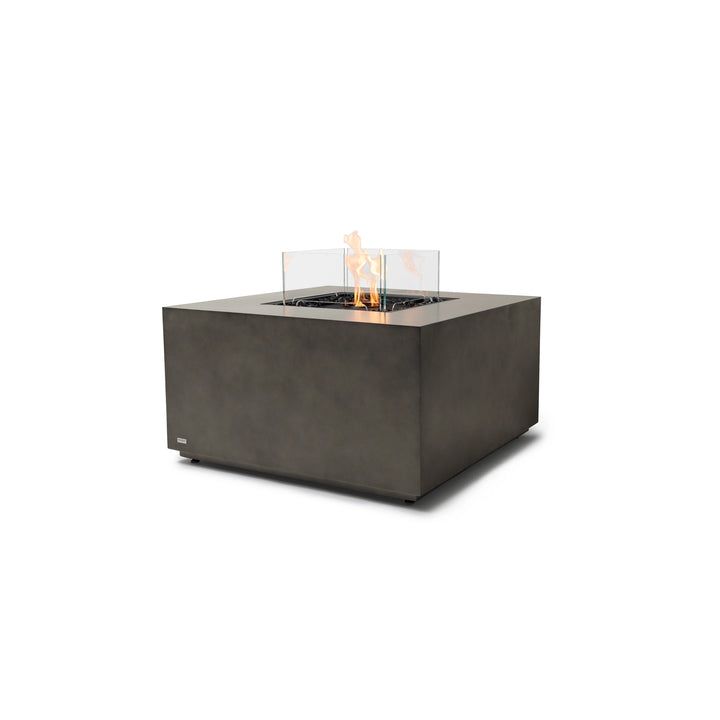 EcoSmart Fire Chaser 38 Natural square gas fire pit featuring a black burner and tempered glass wind guard. The natural concrete finish offers a sleek, modern aesthetic, making it perfect for contemporary patios, backyard retreats, and commercial outdoor spaces.