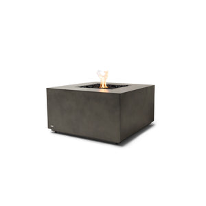 The EcoSmart Fire Chaser 38 Natural gas fire pit with a black burner, featuring a bold, industrial square design. Crafted from durable concrete with a natural finish, this fire pit creates a warm and inviting outdoor ambiance, ideal for patios, backyards, and commercial venues.