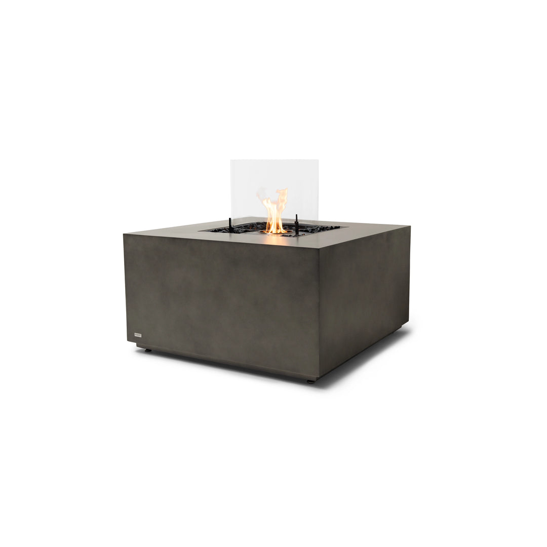 A premium EcoSmart Fire Chaser 38 Natural fire pit featuring a stainless steel burner and glass wind guard, built for durability and style. This propane or natural gas fire pit provides a clean-burning flame, perfect for luxury patios, resorts, and outdoor gathering spaces.