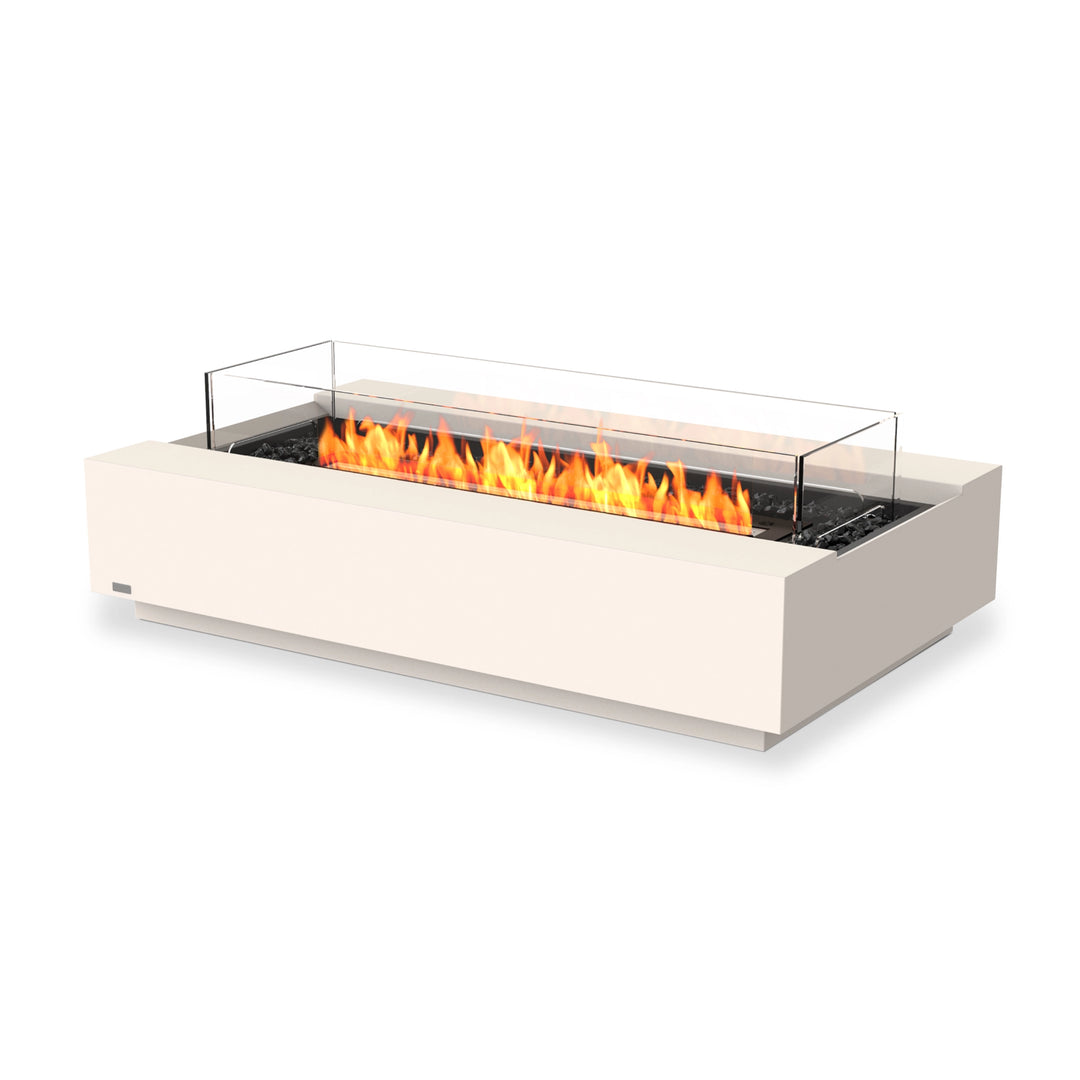 The EcoSmart Fire Cosmo 50 Bone outdoor fire pit features a sleek rectangular concrete base in a bone finish with a black burner and an included glass wind guard. Designed for modern patios and luxury outdoor spaces, this natural gas fire pit creates a warm ambiance while offering a sophisticated, contemporary design. Perfect for backyards, patios, and commercial outdoor settings.