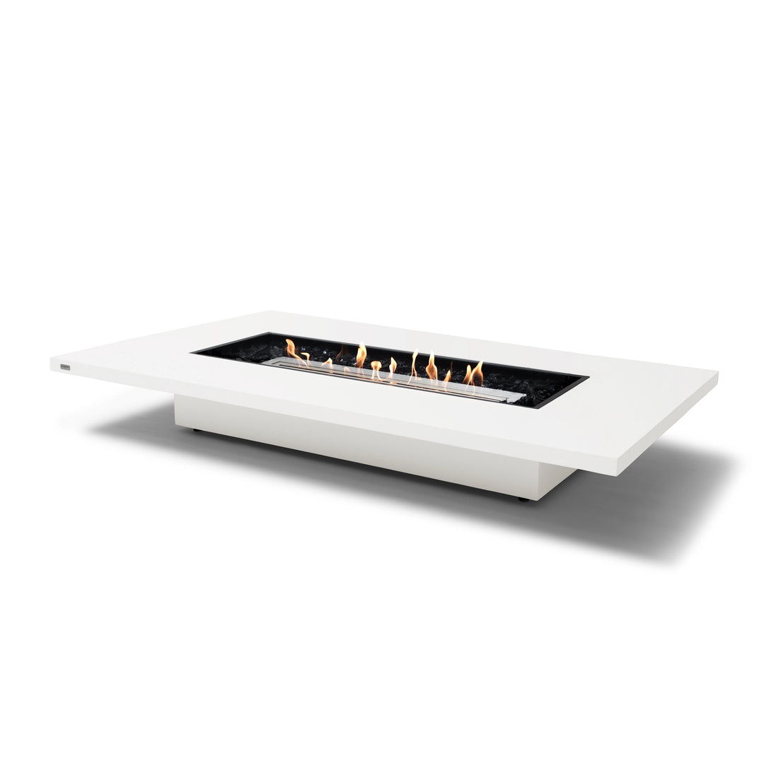 The EcoSmart Fire Daiquiri 70 Bone fire pit features a stainless steel burner set within a contemporary concrete structure, delivering a sophisticated touch to any outdoor space. This long rectangular gas fire pit is ideal for large backyard setups, offering a clean-burning flame and durable design. Whether used as a natural gas fire pit or a propane-powered outdoor fire table, it enhances modern patios with style and warmth.