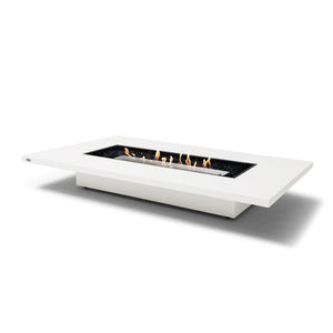 The EcoSmart Fire Daiquiri 70 Bone fire pit features a stainless steel burner set within a contemporary concrete structure, delivering a sophisticated touch to any outdoor space. This long rectangular gas fire pit is ideal for large backyard setups, offering a clean-burning flame and durable design. Whether used as a natural gas fire pit or a propane-powered outdoor fire table, it enhances modern patios with style and warmth.