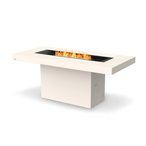 The EcoSmart Fire Gin 90 (Bar) Bone features a sleek rectangular bar-height fire table with a black burner, designed for outdoor and patio settings. This natural gas or propane fire pit has a durable bone-colored concrete finish, delivering both modern style and high-performance heating. Ideal for commercial and residential outdoor spaces, this luxury fire table adds a sophisticated touch to any environment.