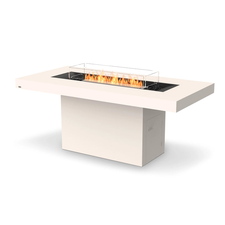 The EcoSmart Fire Gin 90 (Bar) Bone with a stainless steel burner and glass wind guard is a high-end outdoor fire table built for modern patios, decks, and commercial venues. Its bone-colored concrete body is durable and weather-resistant, making it ideal for long-lasting outdoor use. This bar-height gas fire table operates on natural gas or propane, providing a luxurious and efficient heating solution.