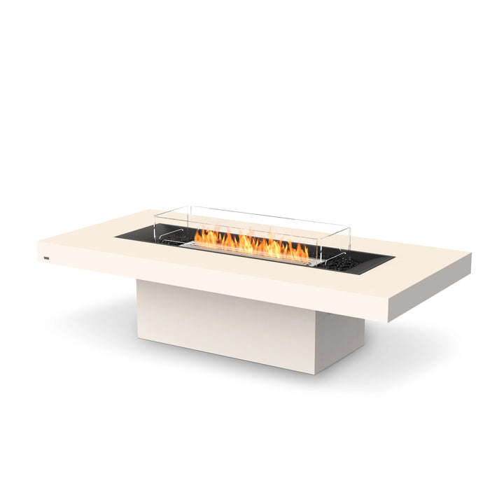 The EcoSmart Fire Gin 90 (Chat) Bone is a premium outdoor fire table with a bone-colored concrete frame, stainless steel burner, and glass wind guard for wind protection. This rectangular gas fire pit is built with high-quality materials to provide durability, elegance, and functionality. The stainless steel burner enhances the fire pit’s sleek modern appeal while ensuring optimal flame performance and corrosion resistance.