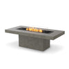 The EcoSmart Fire Gin 90 (Dining) Natural propane fire table comes equipped with a glass wind guard, ensuring steady flames in outdoor settings. Built from high-quality concrete, this rectangular gas fire pit is weather-resistant, making it ideal for patios, backyards, and luxury outdoor dining spaces.