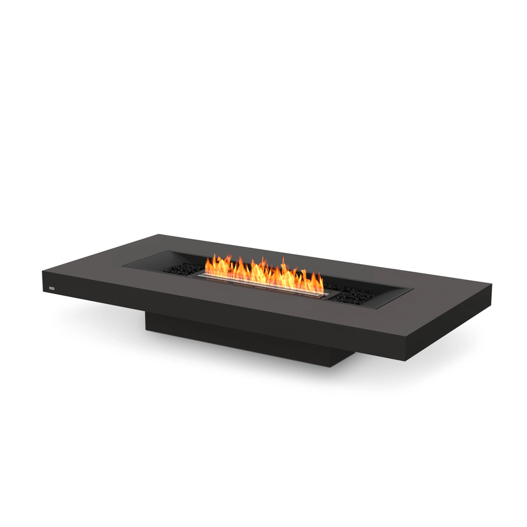 The EcoSmart Fire Gin 90 Low Graphite Fire Pit Table with a black burner delivers a sophisticated and modern fire feature for outdoor spaces. Its rectangular fire pit design offers a sleek, contemporary aesthetic, making it a perfect fire table for upscale patios. Fueled by natural gas or propane, this fire pit coffee table ensures reliable warmth and ambiance.