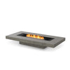 The EcoSmart Fire Gin 90 (Low) Natural fire pit showcases a black burner set in a contemporary, low-profile concrete table. Designed for both residential and commercial outdoor spaces, this natural gas fire pit blends seamlessly with modern patio furniture, creating a cozy and elegant ambiance.