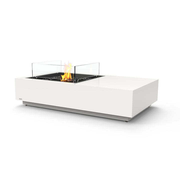 EcoSmart Fire Manhattan 50 Bone modern outdoor fire pit with black burner and wind guard. A sleek rectangular fire table with a protective tempered glass wind guard, ideal for patio or backyard settings. Fueled by natural gas or propane, this fire pit enhances outdoor living spaces with contemporary elegance.