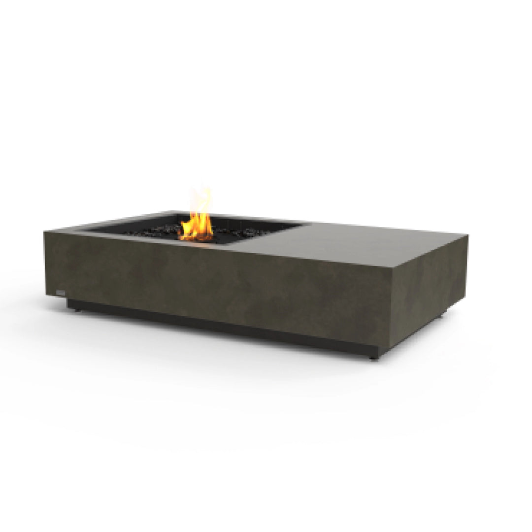 The EcoSmart Fire Manhattan 50 Natural is a sophisticated outdoor fire table with a black burner seamlessly embedded in a natural concrete frame. The rectangular fire pit offers a clean-burning, contemporary design, making it a perfect fit for luxury patios and backyard spaces. Ideal for gas-powered outdoor warmth and ambiance.