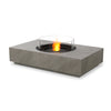 EcoSmart Fire Martini 50 Natural rectangular fire pit table featuring a black burner with a glass wind guard, set in a concrete-style finish. This modern outdoor fire pit is perfect for patios, offering a sleek and durable design that enhances any backyard ambiance. The natural gas fire pit provides a warm, inviting flame, making it an ideal fire table for entertaining.