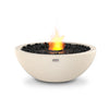 The EcoSmart Fire Mix 600 Bone Fire Pit features a sleek bone-colored concrete bowl with a black burner at the center, surrounded by black fire-resistant stones. This modern outdoor fire pit is designed for bioethanol fuel, offering a clean-burning, smoke-free flame that enhances any patio or backyard setting.