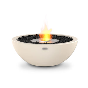 The EcoSmart Fire Mix 600 Bone Fire Pit in a smooth bone concrete finish showcases a stainless steel burner, adding a contemporary touch to outdoor spaces. This eco-friendly, freestanding fire pit runs on bioethanol fuel, producing a smokeless, odor-free flame ideal for patios, backyards, and modern landscapes.