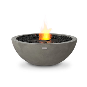 The EcoSmart Fire Mix 600 Natural Fire Pit in a raw concrete natural finish comes with a black burner, offering an organic, rustic aesthetic. This bioethanol fire bowl is ideal for backyard gatherings, patios, and contemporary outdoor spaces, providing a smokeless, odor-free flame with no emissions.