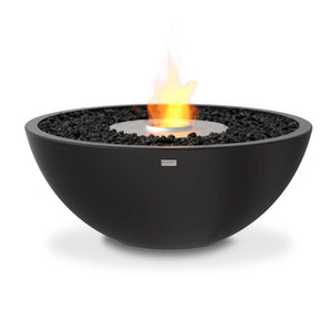 The EcoSmart Fire Mix 850 Graphite Fire Pit presents a deep graphite-colored concrete bowl with a stainless steel burner, offering a striking balance between industrial and modern aesthetics. This premium outdoor gas fire pit is fueled by eco-friendly bioethanol, making it a sustainable luxury fire feature.