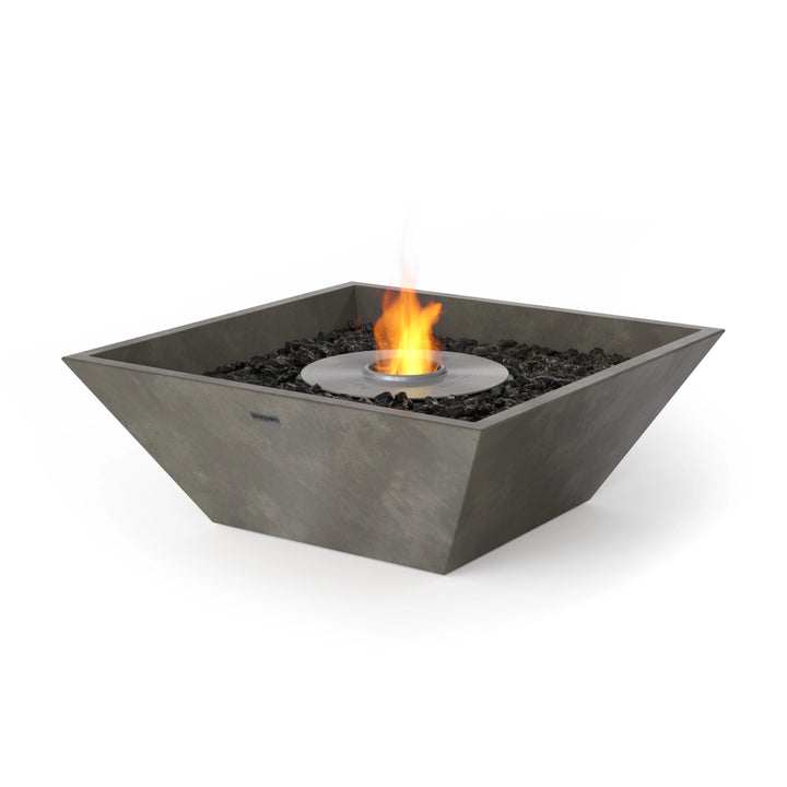 The EcoSmart Fire Nova 600 in Natural with Black Burner combines a rustic concrete finish with a black fire burner, making it a perfect centerpiece for outdoor fire pits, patio fire tables, and modern backyard fire pits. The black fire glass enhances the natural aesthetic for a warm and inviting ambiance.