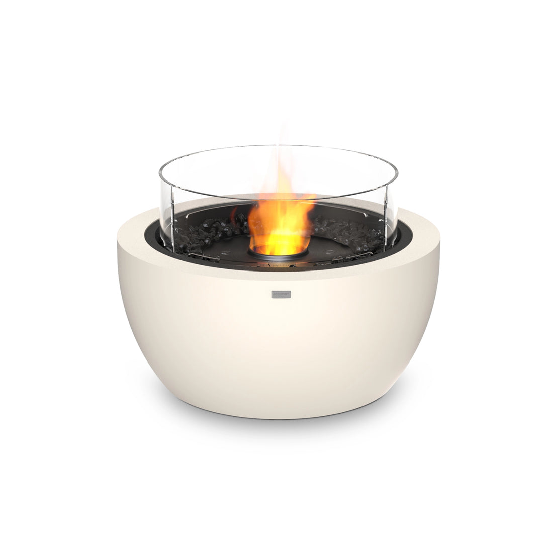 The EcoSmart Fire Pod 30 in bone finish with a black burner and wind guard offers a modern outdoor fire pit experience. Featuring a sleek, round concrete design, this ethanol fire pit delivers clean-burning flames surrounded by a protective glass wind guard, ensuring safety and stability in outdoor environments. Ideal for patios, backyards, and luxury outdoor spaces, this fire pit enhances ambiance while providing warmth and elegance.