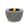 The EcoSmart Fire Pod 40 in a natural concrete finish features a black burner and black fire media. This round gas fire pit offers a sleek, modern design, making it a perfect outdoor fire pit for backyard patios, decks, or garden seating areas.