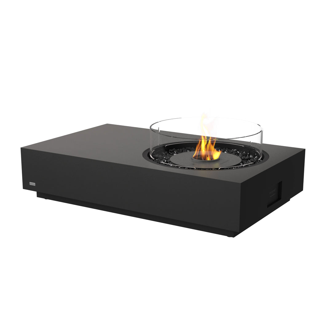 The EcoSmart Fire Tequila 50 Graphite rectangular fire pit table with a black burner and glass wind guard. Designed for outdoor and indoor use, this modern fire feature provides a sleek, industrial-inspired centerpiece with a smokeless flame, durable concrete finish, and black fire media.