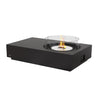 The EcoSmart Fire Tequila 50 Graphite featuring a stainless steel burner and glass wind guard for enhanced flame stability. With a graphite concrete base, this modern outdoor fire pit offers a durable, weather-resistant design perfect for luxury patio settings.

