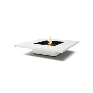 The EcoSmart Fire Vertigo 50 Bone square fire pit table features a sleek bone-white concrete body with a black burner at the center, surrounded by premium black fire glass. This modern fire pit is perfect for outdoor or indoor spaces, providing a contemporary centerpiece with clean-burning flames. Ideal for luxury patios, backyard gatherings, and commercial fire pit areas.