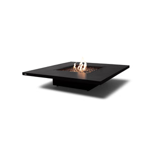 EcoSmart Fire Vertigo 50 Graphite propane fire pit, a sophisticated and contemporary outdoor fire feature. The large square tabletop provides ample space, while the recessed fire media creates a visually striking centerpiece. Designed for luxury patios and outdoor living areas, this propane gas fire pit offers convenience, a modern aesthetic, and high-performance flames that elevate any outdoor ambiance.