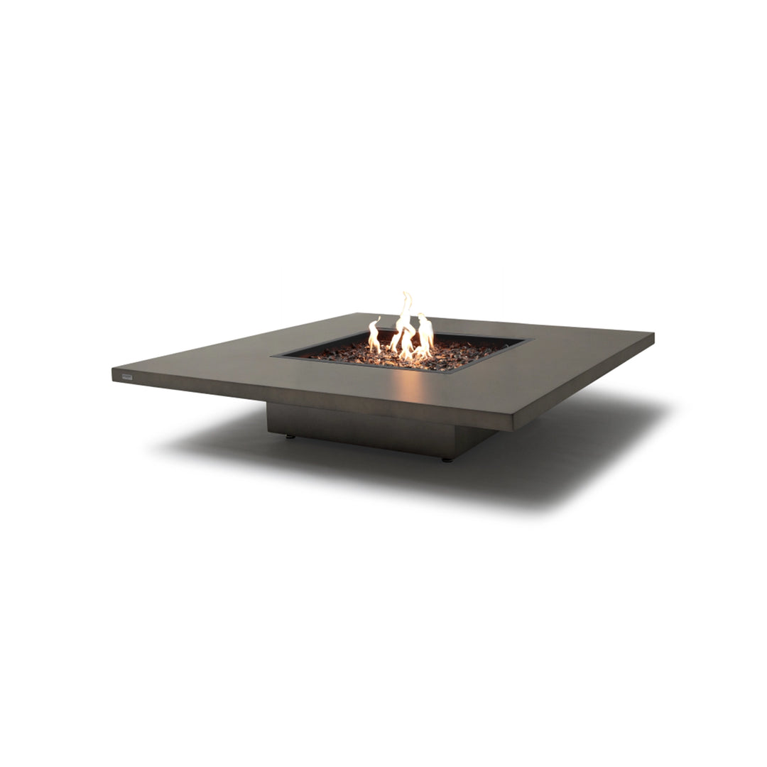 The EcoSmart Fire Vertigo 50 Natural propane fire pit is a luxury outdoor heating solution designed for modern patio spaces. The propane-powered fire feature includes a square concrete tabletop in a natural gray finish, with a recessed firebox containing lava rock media for an authentic flame presentation. Built with durable weather-resistant materials, it offers efficiency and elegance, making it a perfect backyard centerpiece for year-round enjoyment.