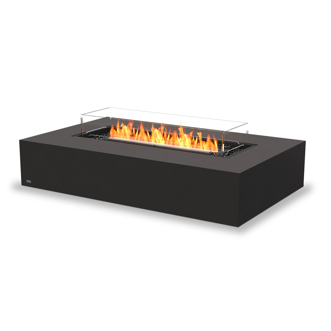 The EcoSmart Fire Wharf 50 in graphite finish features a black burner with a protective glass wind guard, enhancing safety and flame visibility. This modern outdoor fire pit is a sleek centerpiece for patios and outdoor spaces, delivering warmth and ambiance.