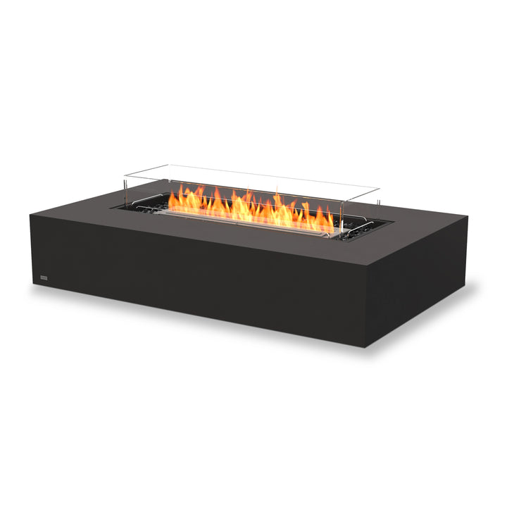 EcoSmart Fire Wharf 50 in graphite with a stainless steel burner and wind guard, combining durability with sophisticated design. The glass guard enhances safety while allowing a stunning flame display, making it an ideal outdoor fire pit.