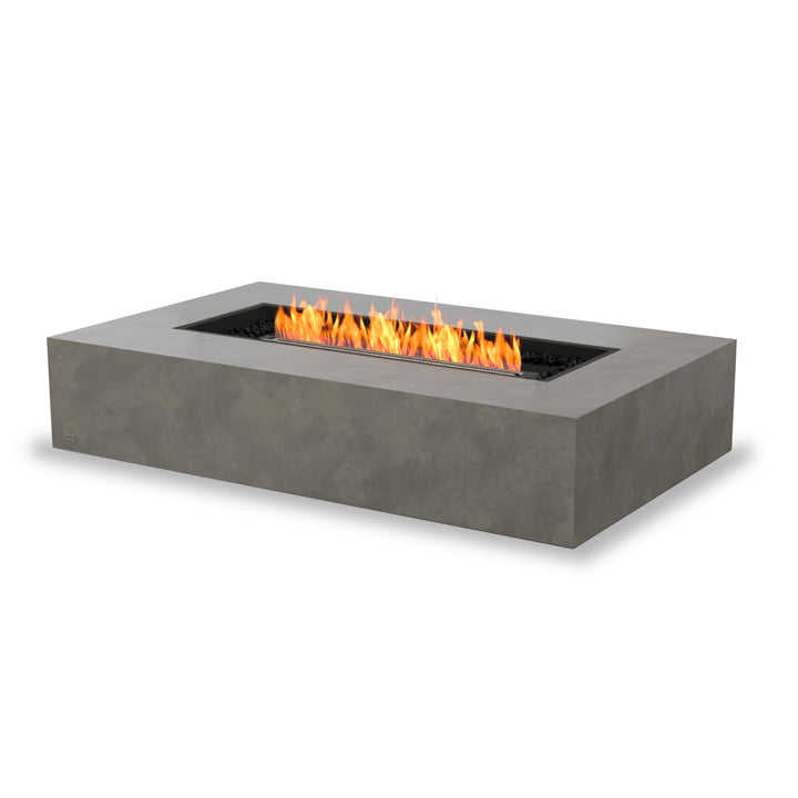 EcoSmart Fire Wharf 50 natural finish fire pit with a black burner, showcasing a smooth concrete construction. This modern outdoor fire pit blends minimalism and functionality, perfect for patios, backyards, and outdoor gas fire pits