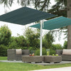 Side view of the FIM Umbrellas Flexy Twin 8x17' Rectangular Dual Shade Umbrella set up in a stylish patio area. The image showcases the expansive dual canopy providing ample shade for outdoor furniture, making it ideal for large patios, poolsides, and garden settings. The sophisticated design adds elegance to any outdoor space.