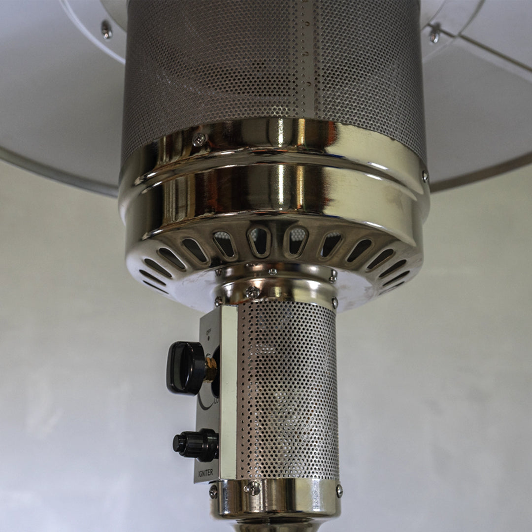 Close-up view of the Golden Flame Outdoor Natural Gas Patio Heater’s ignition system and burner assembly. The image focuses on the stainless steel ignition controls, including the On/Off knob and the adjustable heat control knob labeled ‘Low’ and ‘Igniter.’ The mesh burner cover and air vent detailing are visible, highlighting the heater’s efficient heat distribution and safety features. The durable stainless steel construction adds to the product's weather-resistant qualities, making it a reliable choice f